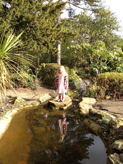 Girl on stepping stones, Highlands Gardens